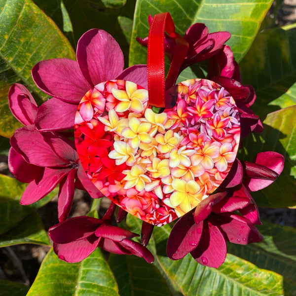 heart shape ornament filled with plumeria