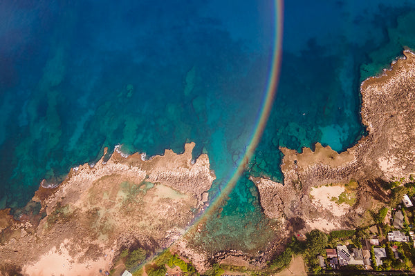 rainbow reflecting on water